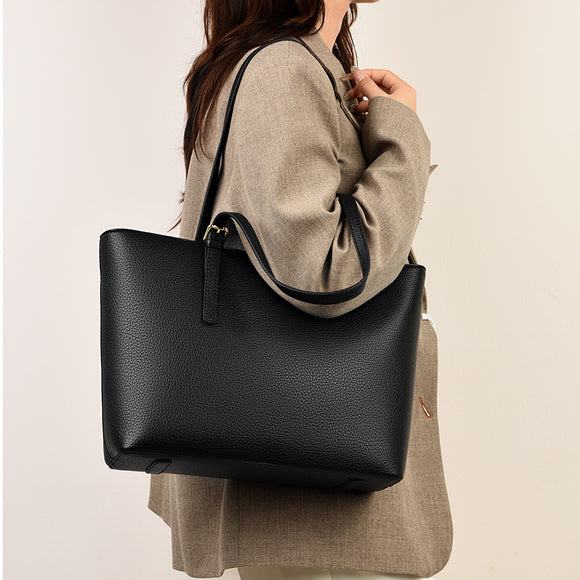 Bolsa de Hombro Commuter de Gran Capacidad y Diseño Versátil
