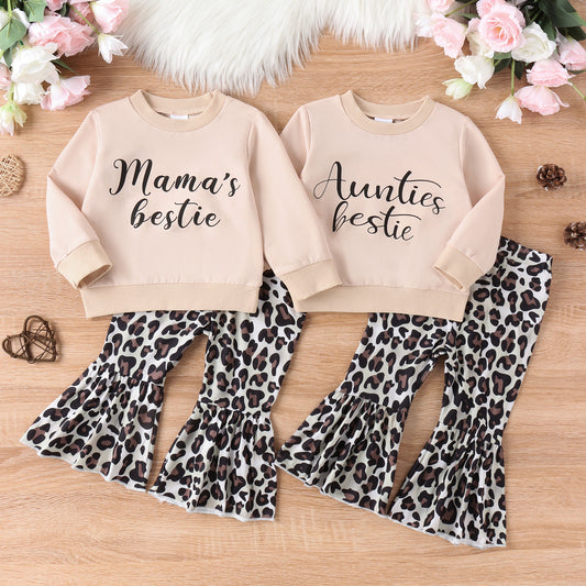 Girls' light pink "Mama's bestie" long-sleeve top with leopard print bell-bottom pants.