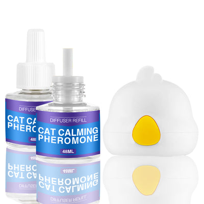 Cat Calming Pheromone Diffuser Kit with a white plug-in diffuser and a green refill bottle, next to its green and white box. - Image 7