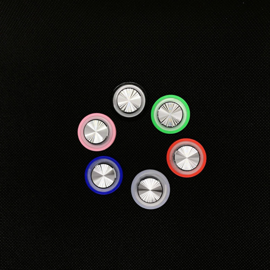 Pink and silver mobile game joystick attached to a black smartphone displaying a game on its screen. - Image 2