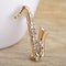 Broche de Saxofón con Diamantes - Joya Musical Elegante