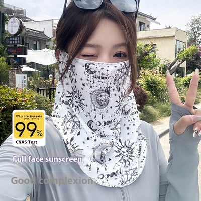 Black paisley sun mask with white pattern and ear loops, covering the lower face and neck, worn outdoors. - Image 7