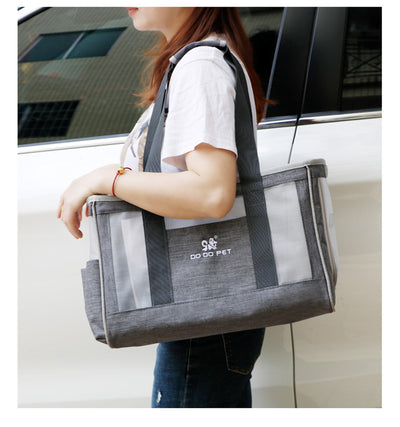 Navy blue portable pet carrier bag with mesh windows, top handles, and a side pocket for small dogs or cats. - Image 24