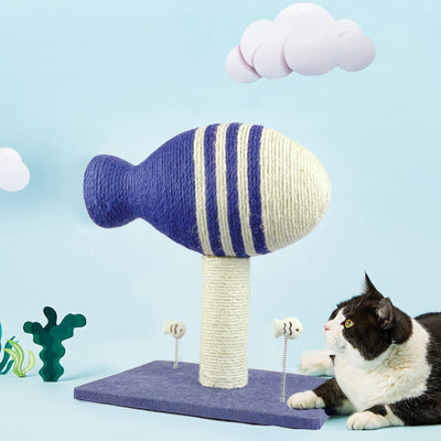Blue and white striped fish-shaped sisal cat scratching post with a purple base, next to a black and white cat. - Image 4