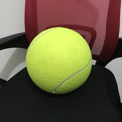 Giant yellow tennis ball with white seams for dogs, resting on a black office chair. - Image 8