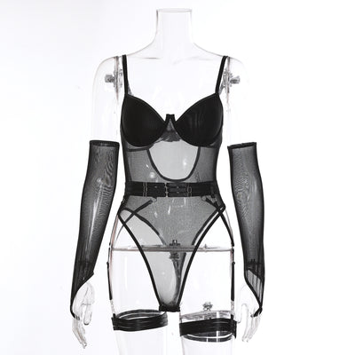 Pink mesh see-through jumpsuit with garter straps and matching arm sleeves, laid flat on a pink background. - Image 6