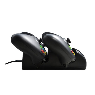 Black dual charging dock for Xbox One wireless controllers with an LED display, shown with two black controllers. - Image 5