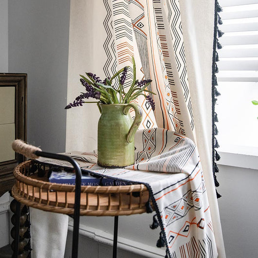 Boho cream cotton and linen curtain with tribal print in black and orange, featuring black fringe tassels. - Image 7