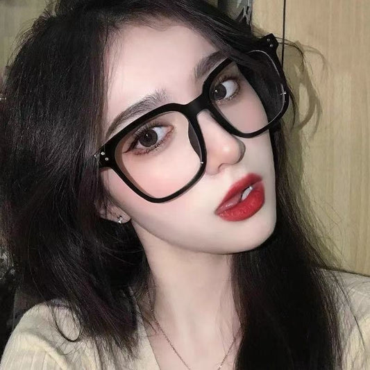 Full-frame trendy blue light blocking glasses with a transparent blue square frame and clear lenses. - Image 2
