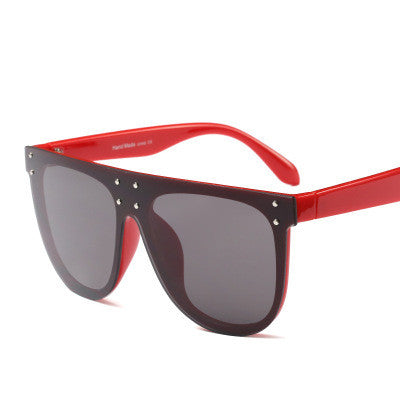 Black and white flat top sunglasses with dark lenses and small gold-toned stud details on the frame. - Image 12