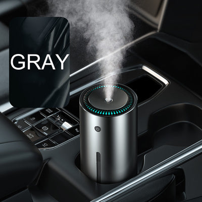 Dark gray cylindrical vehicle-mounted humidifier with a power button, mist outlet, and water level indicator. - Image 6