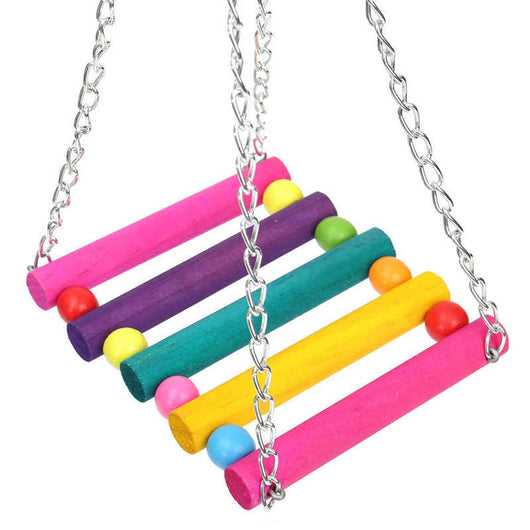 Colorful suspension bridge swing for birds, featuring wooden logs in green, purple, yellow, blue, and red, with small beads and metal chains. - Image 9