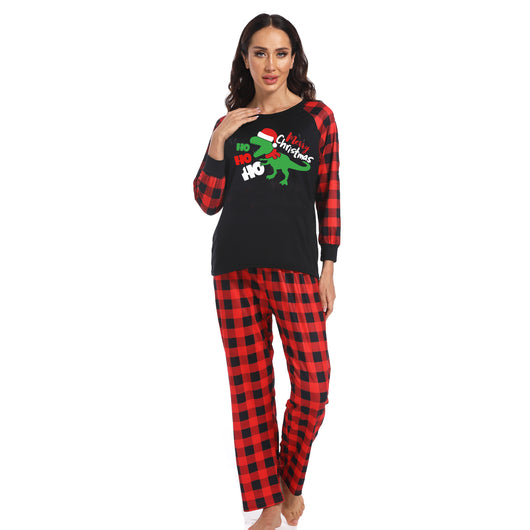 Black baby romper with red plaid sleeves and cuffs, featuring a green dinosaur wearing a Santa hat and "Merry Christmas" text. - Image 3
