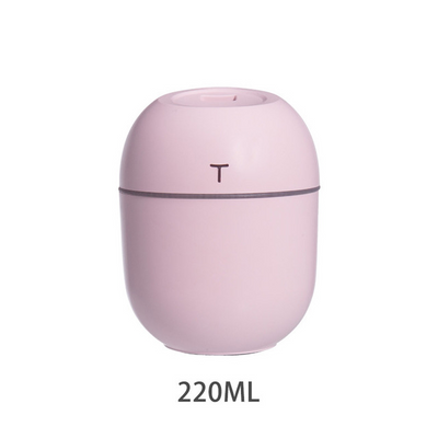 White egg-shaped mini USB humidifier with a 220ml capacity, featuring a subtle 'T' logo and grey accent line. - Image 7