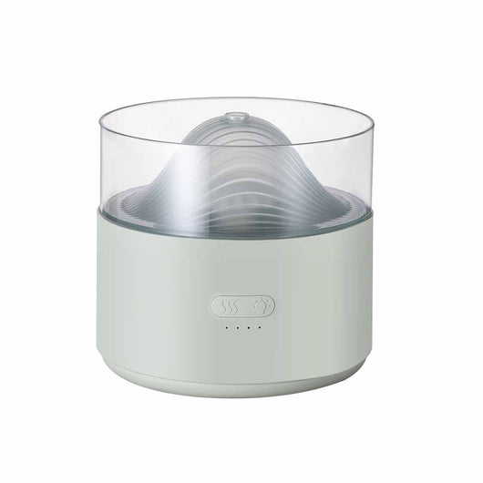 White cool-mist humidifier and aroma diffuser with glowing blue LED lights and orange crystal salt rocks, emitting mist. - Image 10