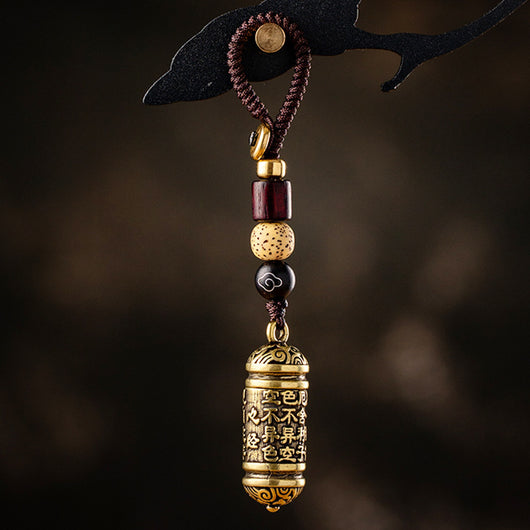 Llavero Colgante Tubo de Latón con Sutra del Corazón Tibetano - Image 5