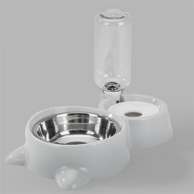 White pet feeding station with a stainless steel food bowl and a clear automatic water dispenser bottle. - Image 13