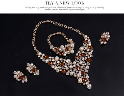 Four-piece bridal jewelry set with gold-toned necklace, earrings, bracelet, and ring, featuring amber and clear rhinestones with faux pearls. - Image 11