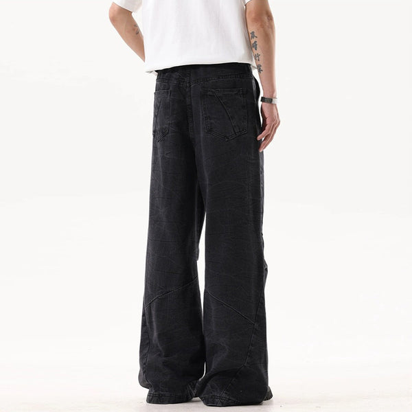 Jeans Negros Lavado Vintage con Pierna Ancha y Costuras Decorativas
