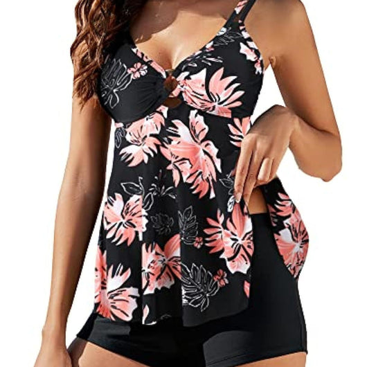 Women's plus size two-piece swimsuit with a red floral print tankini top and black boxer swim shorts. - Image 4