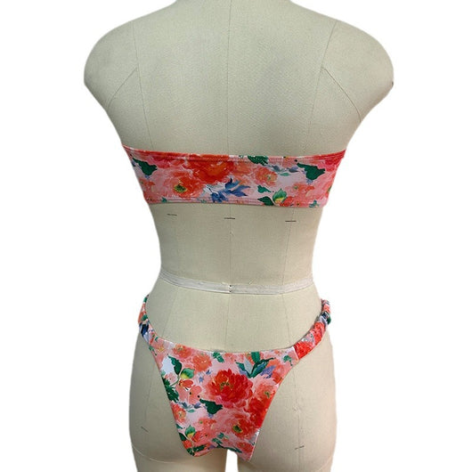 Floral print tube top bikini with blue and purple flowers, white lace trim, and a central ring detail. - Image 4