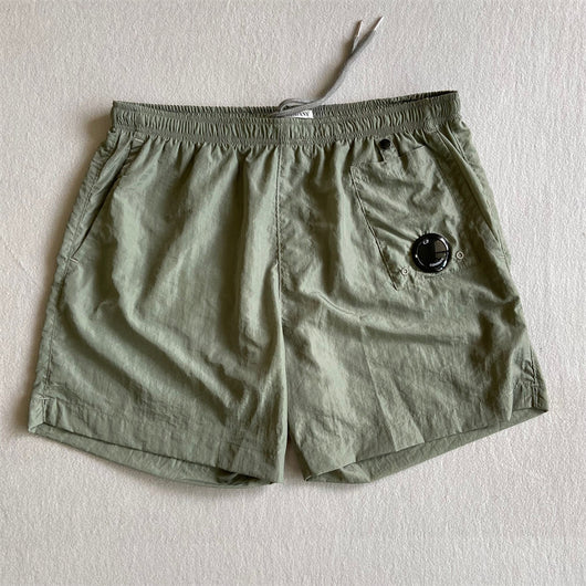 Pantalones Cortos Deportivos Sueltos de Nylon para Playa - Estilo Juvenil Verano - Image 4