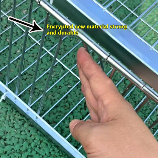 Black wire pigeon cage with a flat top and bottom, designed for one-way entry, shown on a gray surface. - Image 8