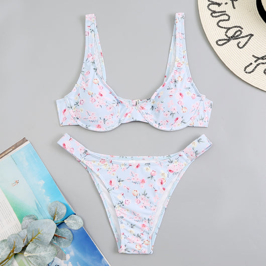 Light blue floral bikini with pink and yellow flowers, featuring an underwire top and high-cut bottom. - Image 23