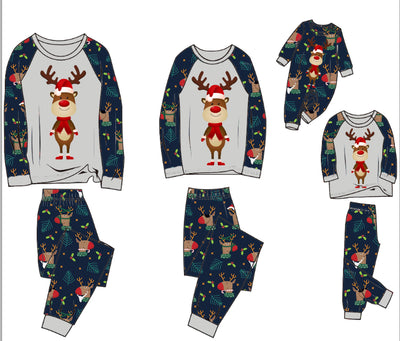 Family Christmas pajamas with a cartoon reindeer wearing a Santa hat and red scarf on a black top, and dark blue pants with a repeating reindeer and holly patte - Image 6