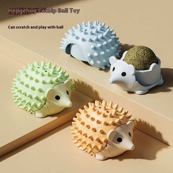 Grass green hedgehog catnip ball toy with a spiky back and smooth face, designed for scratching and play.
