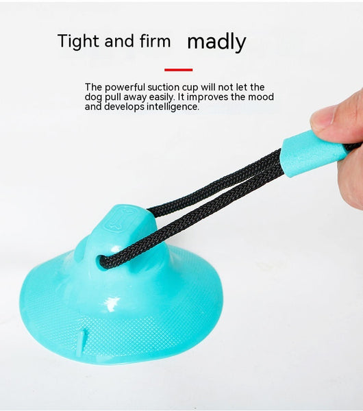 Green dog toy with a suction cup base and a textured ball on a black cord, designed for food dispensing and teeth cleaning. - Image 10