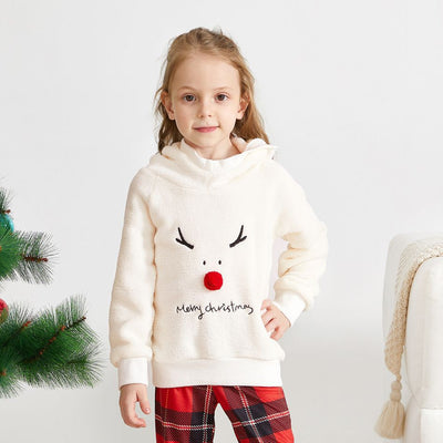 Family of four wearing matching cream fleece reindeer pajamas with red plaid pants, posing for a Christmas photo. - Image 4