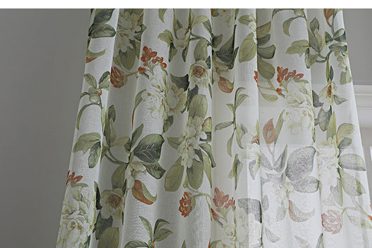 Dark gray semi-sheer curtains with a white and green floral pattern, hung on a black rod in a living room. - Image 18