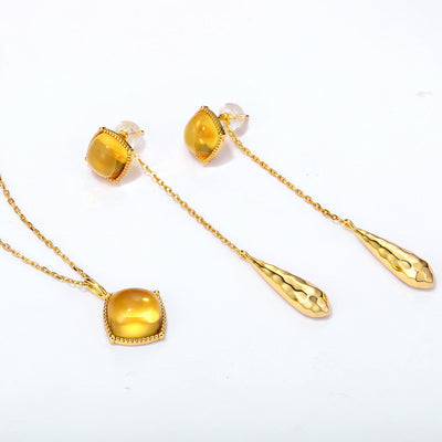 Aretes Geométricos con Borla Colgante - Image 7