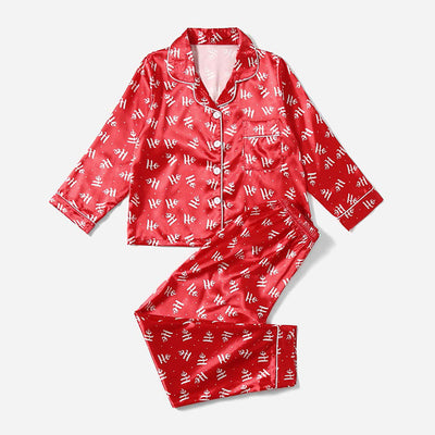 Three dark blue family pajama sets with white and light blue snowflake patterns, featuring long-sleeve tops and pants. - Image 9