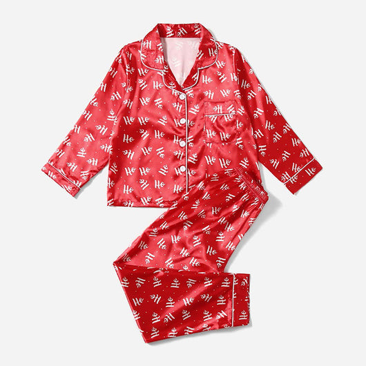 Three dark blue family pajama sets with white and light blue snowflake patterns, featuring long-sleeve tops and pants. - Image 9
