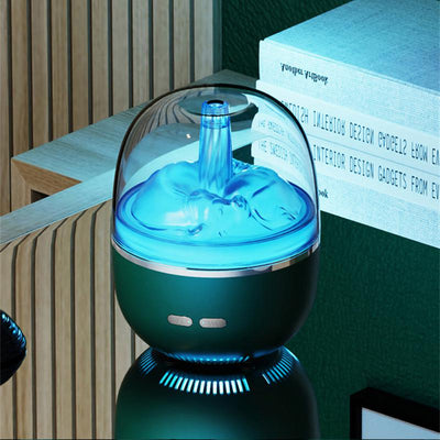 White essential oil diffuser and humidifier with a clear dome top, glowing red inside, and blue LED base light. - Image 4