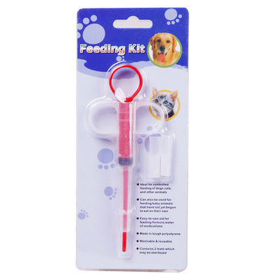 Pet feeding kit with a green syringe-style feeder and two clear teats, packaged for dogs and cats. - Image 8