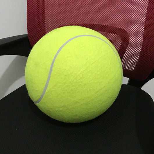 Giant yellow tennis ball with white seams for dogs, resting on a black office chair. - Image 10