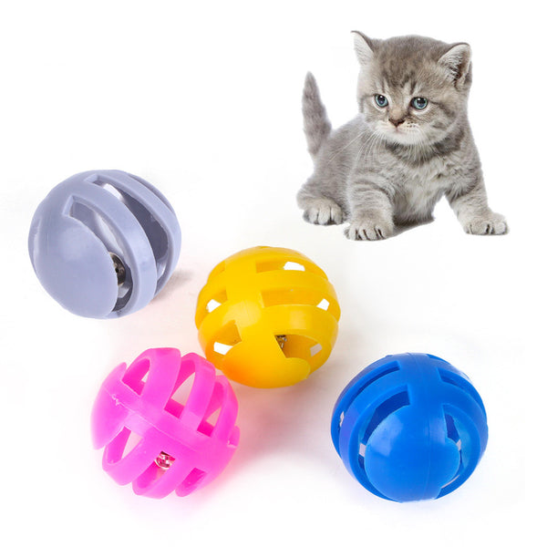 Four colorful plastic bell balls for cats in yellow, pink, blue, and grey, featuring a slotted design.