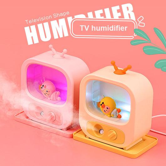 Pink TV-shaped desktop humidifier with a cute pink caterpillar figure inside, featuring a mist outlet and control knob. - Image 6
