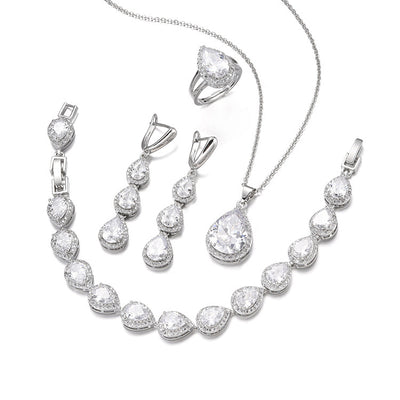 Green pear-shaped gemstone jewelry set with necklace, dangle earrings, ring, and bracelet, all with clear stone accents. - Image 6