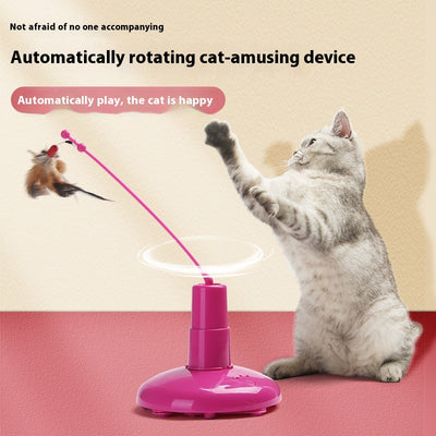 Pink automatic cat toy with a rotating pole and a brown feather attachment, measuring 15cm high.