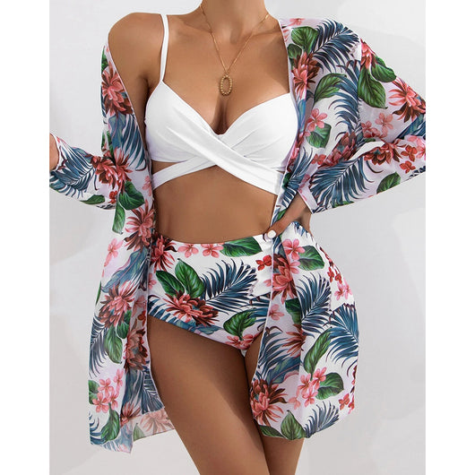 White criss-cross bikini top with high-waisted tropical floral print bottoms and matching long-sleeved cover-up. - Image 7
