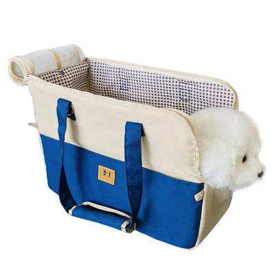 Two-tone beige and brown canvas pet carrier bag with mesh top and a small white dog peeking out. - Image 4