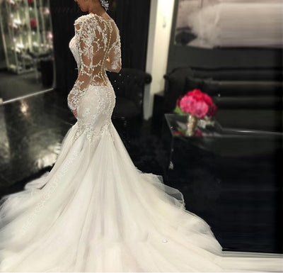 Vestido de Novia Elegante con Encaje Delicado y Silueta Estilizada - Image 3