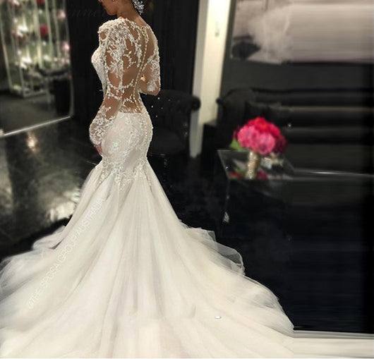 Vestido de Novia Elegante con Encaje Delicado y Silueta Estilizada - Image 3