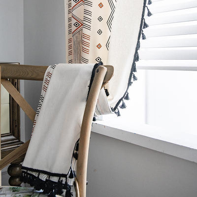Boho cream cotton and linen curtain with tribal print in black and orange, featuring black fringe tassels. - Image 14