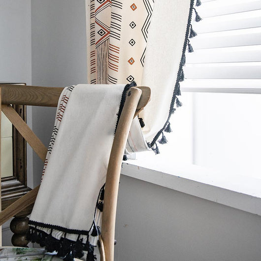 Boho cream cotton and linen curtain with tribal print in black and orange, featuring black fringe tassels. - Image 14