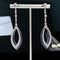 Aretes Hueco con Borla Larga para Mujer